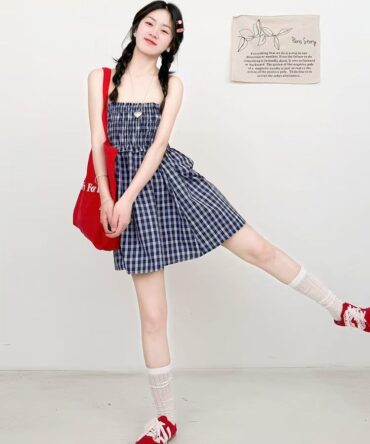 I'm wearing a dress with a checkered pattern.