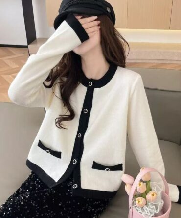 Contrasting round-neck knitted cardigan